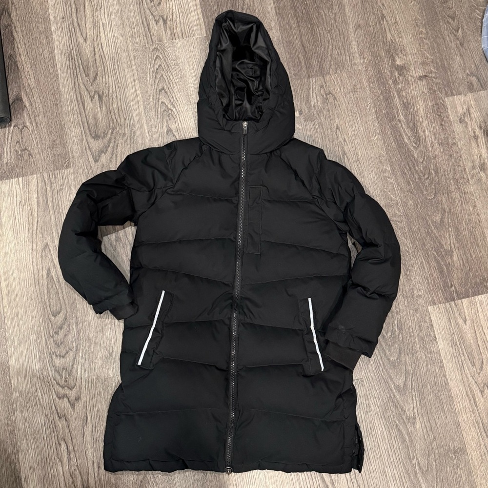 In very good condition, 2 side pockets, 1 pocket in front chest